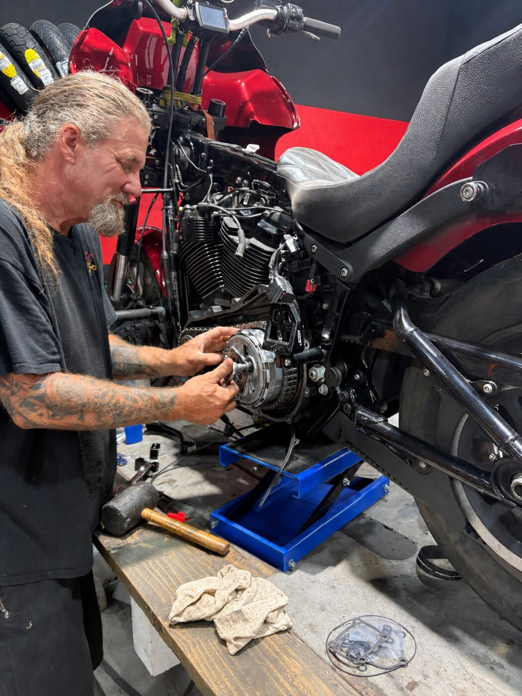 Sean performing hands-on motorcycle service
